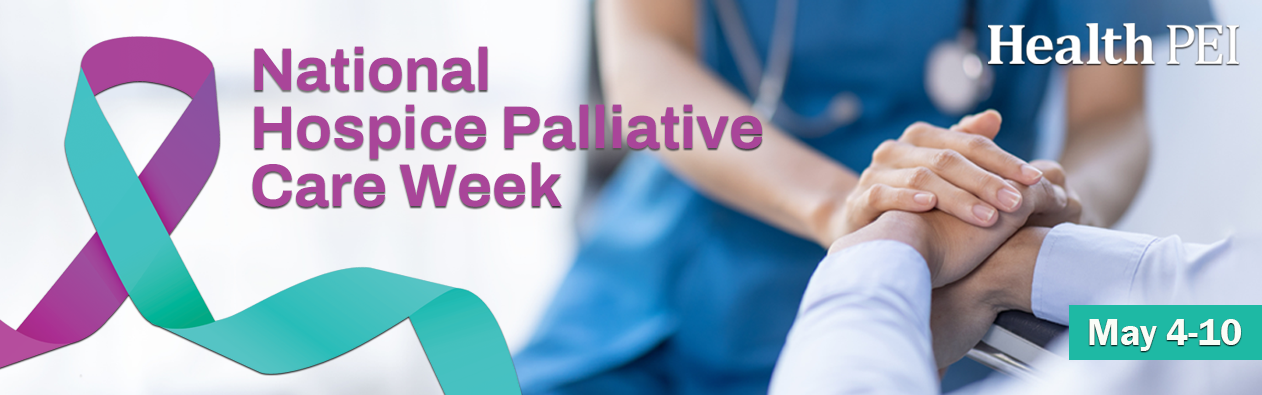 A health care worker wearing blue scrubs and a stethoscope, holding the hand of a patient. A purple and green ribbon is displayed on the left with the words National Hospice Palliative Care Week, May 4-10